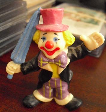 Hard Plastic Clown with Umbrella Figurine