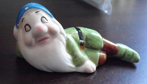 sleepy dwarf figurine