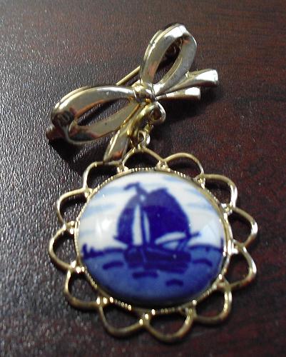 Gold Tone MEtal Pin Bow and Blue Ship