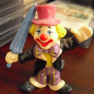 Hard Plastic Clown with Umbrella Figurine