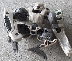 Small White and Gray Transformer Action Figure