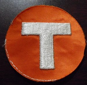 Embroidered Patch - Orange and White Letter T