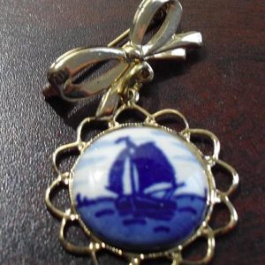 Gold Tone MEtal Pin Bow and Blue Ship