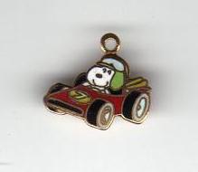 Gold Tone Enameled Snoopy in Racecar Pendant